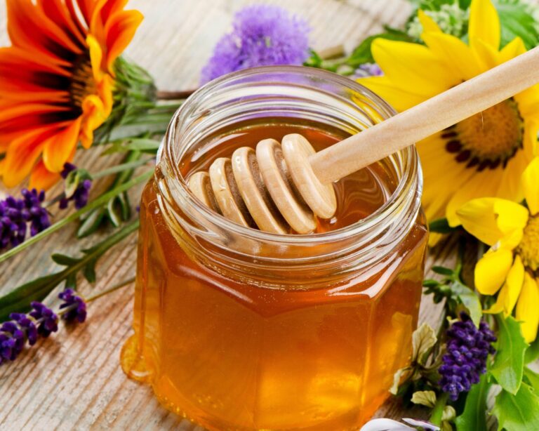 June Honey with seasonal flowers witch's almanac